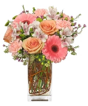 A Cameron's Flower Shop hand-tied bouquet on the design counter